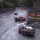 SVG spinning out Courtney at Turn 9, Lowndes in the lead.